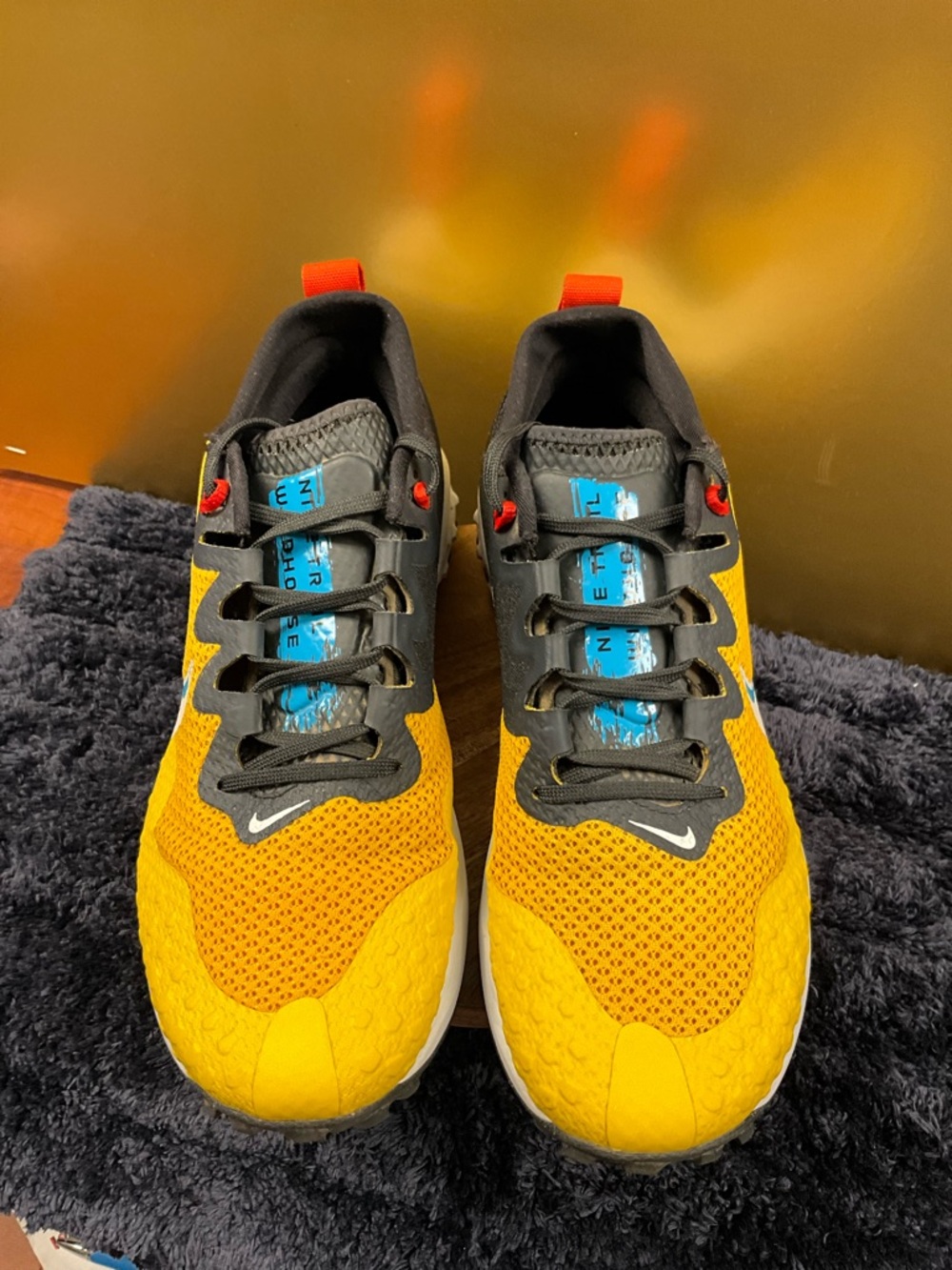 Nike Kids' Yellow and Black Lightweight Sneakers with Red Pull Tabs